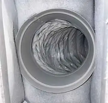 Before and after images highlighting dirty and freshly cleaned dryer vent system in O’Fallon